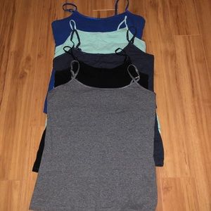 FIVE cami tank tops.